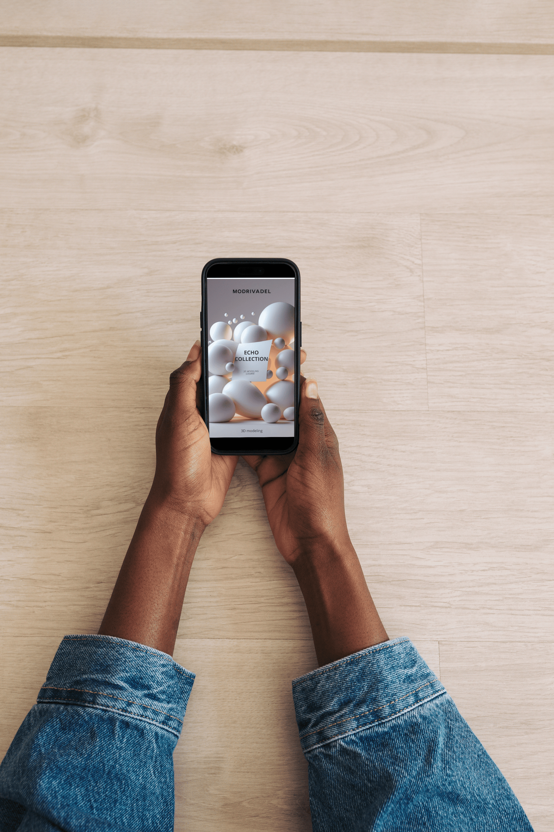 Person holding a smartphone with a screen displaying an app interface on a wooden surface